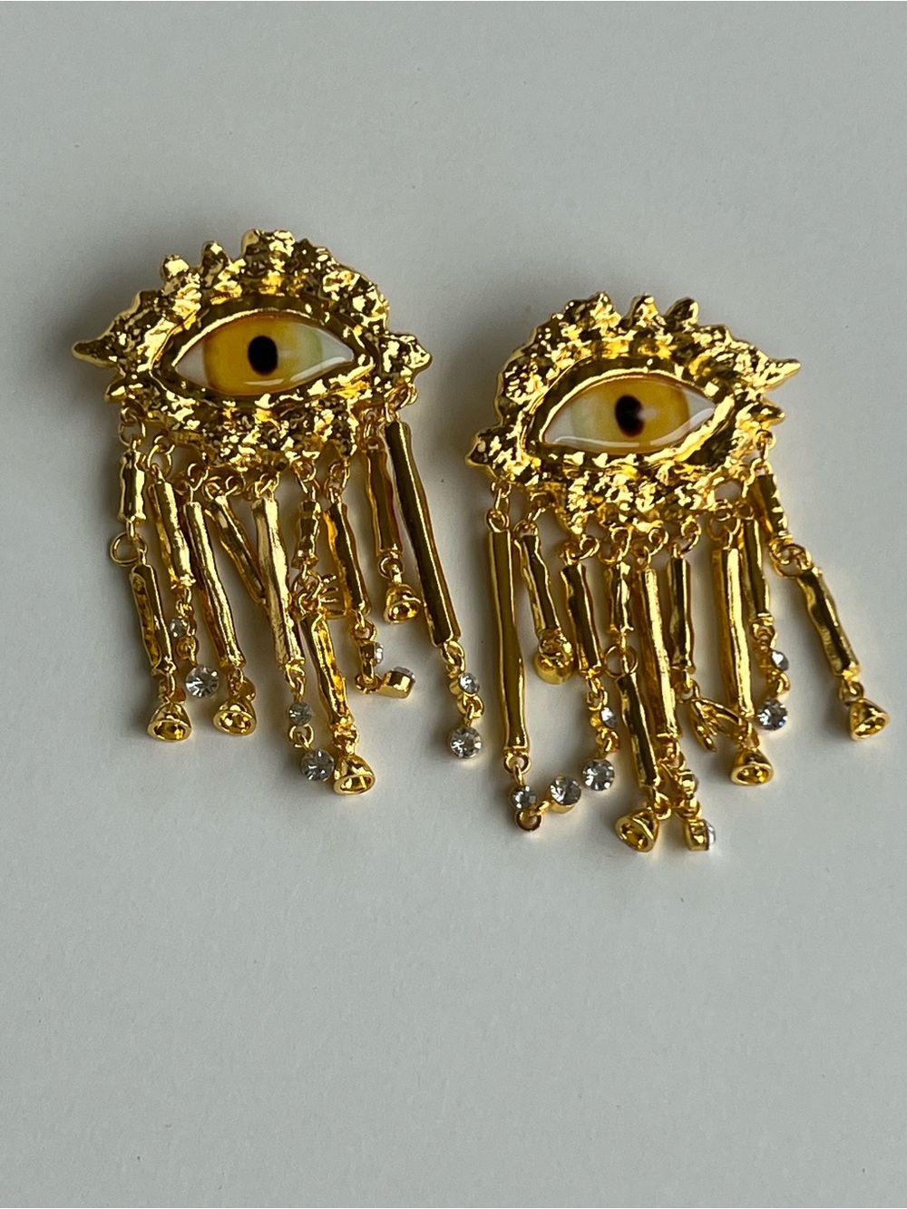 Schiaparelli Gold Eye Dangle Earrings with Yellow Enamel Accent